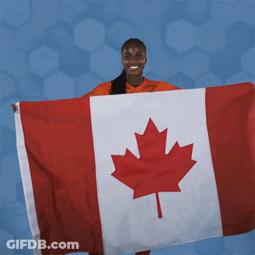 Woman Holding Large Canadian Flag GIF