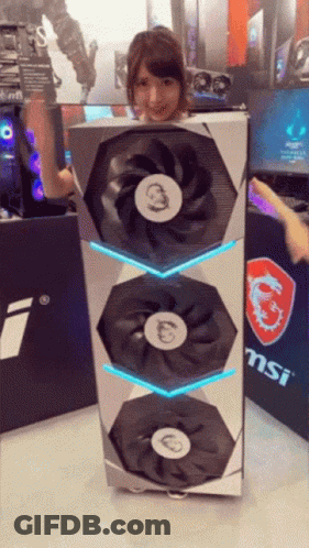 Woman Holding Large MSI Fan In Front Of MSI Sign GIF