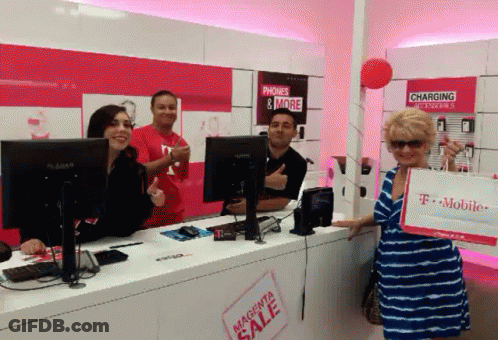 Woman Holding Magenta Sale Bag At T-Mobile Store GIF