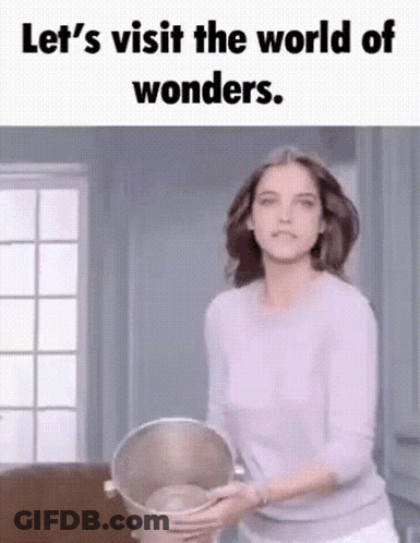 Woman Holding Magnifying Glass GIF
