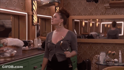 Woman Holding Magnifying Glass At Mirror GIF