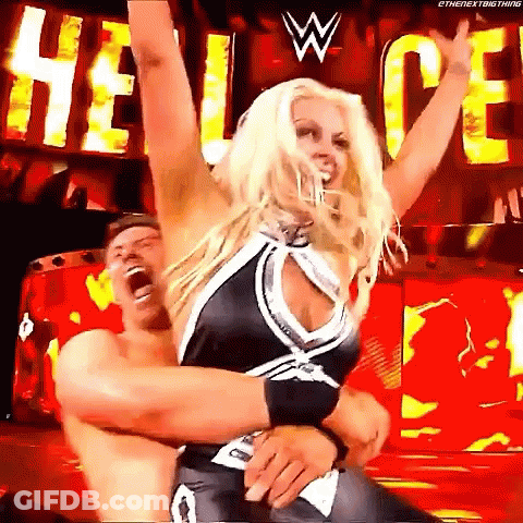Woman Holding Man In Her Arms GIF