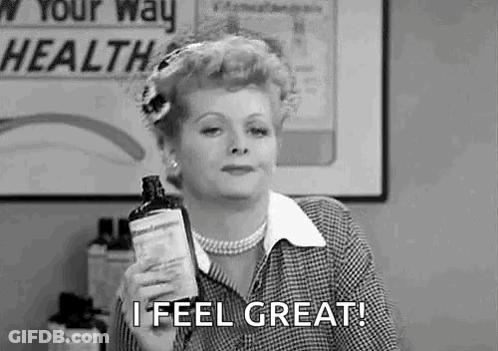 Woman Holding Medicine Bottle Saying I Feel Great! GIF