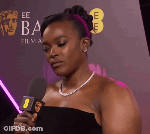 Woman Holding Microphone At EE Ba Film Awards GIF