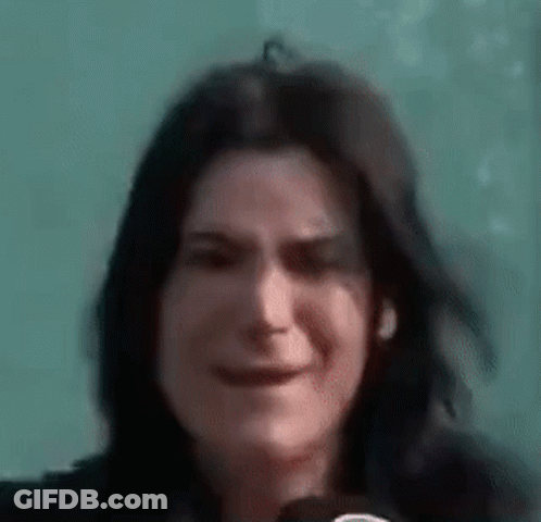 Woman Holding Microphone Close Up GIF