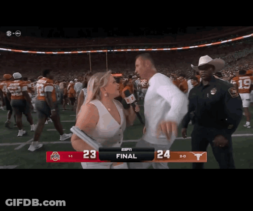Woman Holding Microphone In Front Of Scoreboard Saying Final GIF