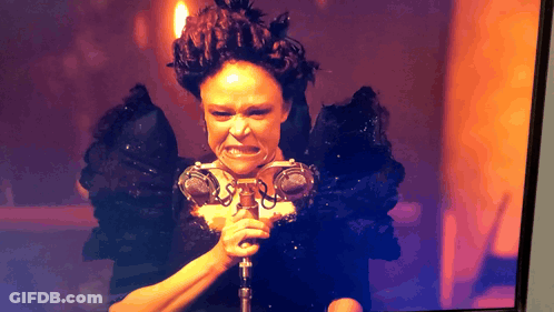Woman Holding Microphone Making Face GIF