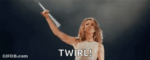 Woman Holding Microphone On Stage Saying Twirl GIF
