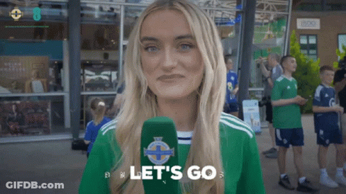 Woman Holding Microphone Saying Let's Go On It GIF