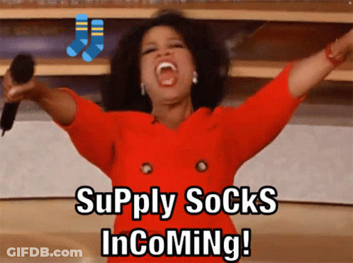 Woman Holding Microphone Saying Supply Socks Incoming GIF