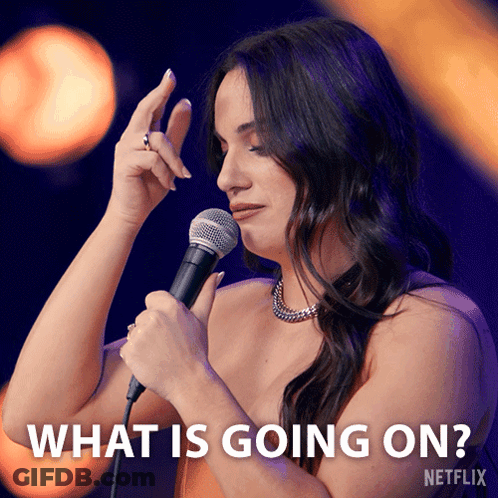 Woman Holding Microphone Saying What Is Going On GIF