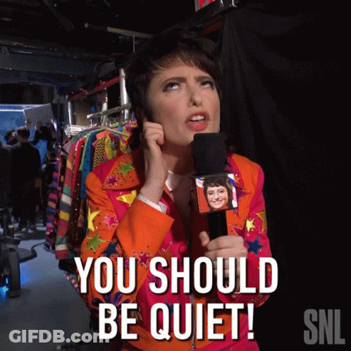 Woman Holding Microphone Saying You Should Be Quiet GIF