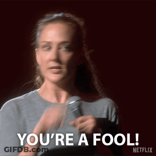 Woman Holding Microphone Says You're A Fool GIF