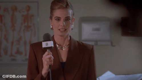 Woman Holding Microphone With Number 8 GIF
