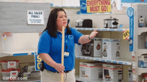 Woman Holding Mop In Front Of Everything Must Go Sign GIF