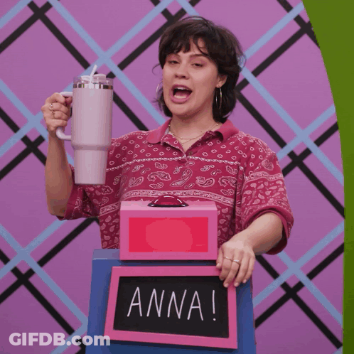 Woman Holding Mug And Box Saying Anna GIF