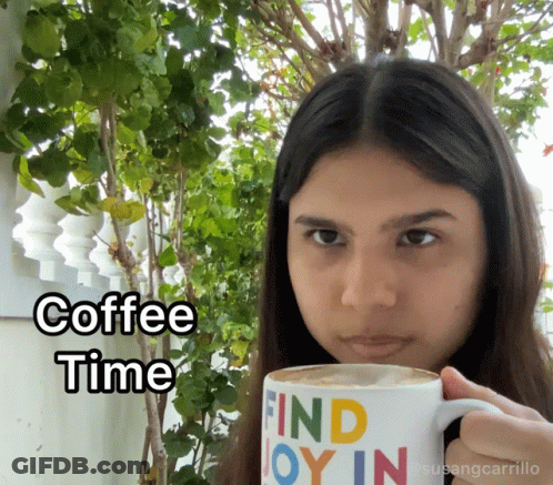 Woman Holding Mug Saying Find Joy In GIF