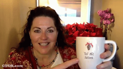 Woman Holding Mug Saying Tis The Season GIF