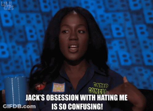 Woman Holding Mug Wearing Camp Combs Shirt GIF