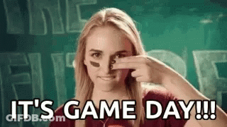 Woman Holding Nose In Front Of Game Day Sign GIF