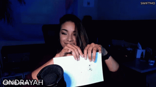 Woman Holding Paper At Microphone With Ondrayah GIF