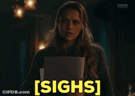 Woman Holding Paper Making Funny Face GIF
