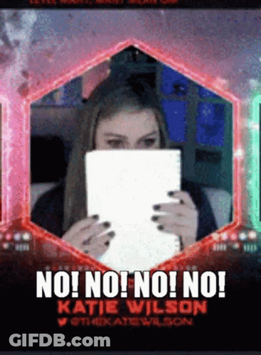 Woman Holding Paper Saying Katie Wilson GIF