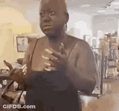 Woman Holding Perfume Bottle GIF