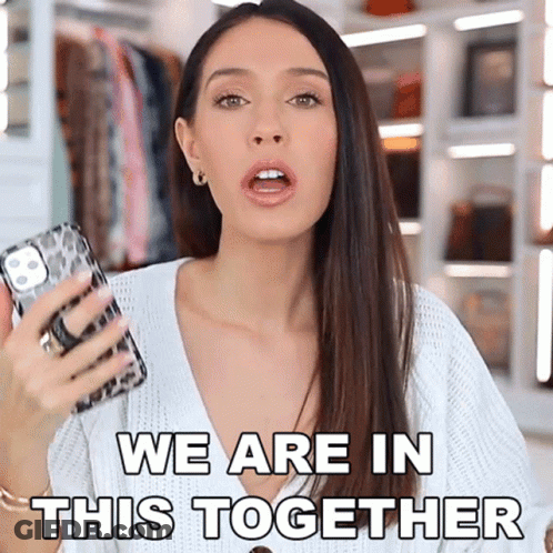 Woman Holding Phone Saying We Are In This Together GIF