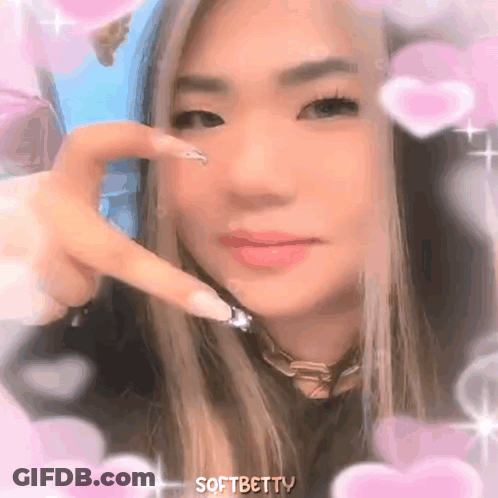 Woman Holding Pink Heart GIF