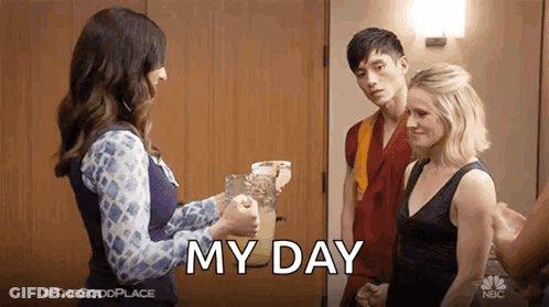 Woman Holding Pitcher Of Lemonade Next To Man And Woman GIF