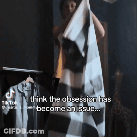 Woman Holding Plaid Blanket Saying Obsession Issue GIF