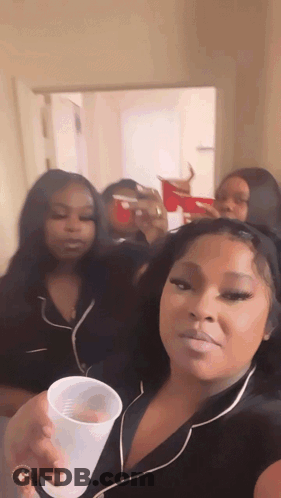 Woman Holding Plastic Cup To Face GIF
