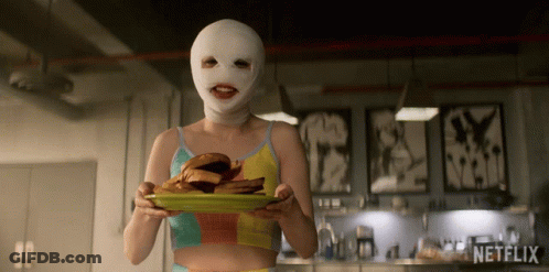 Woman Holding Plate Of Food With Netflix GIF