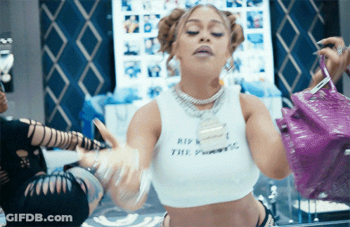 Woman Holding Purple Purse And Rip Tank Top GIF