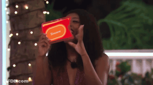 Woman Holding Red Card Sincere GIF