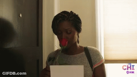 Woman Holding Rose And Paper Saying Chi GIF