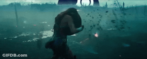 Woman Holding Shield In Battle Scene GIF