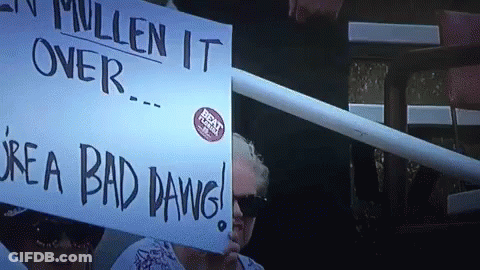 Woman Holding Sign I'm A Bad Dawg GIF