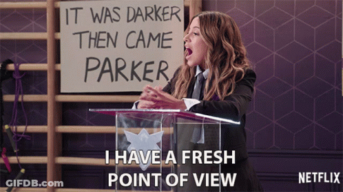 Woman Holding Sign It Was Darker Then Came Parker GIF
