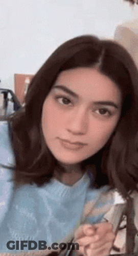 Woman Holding Sign Saying Ally GIF