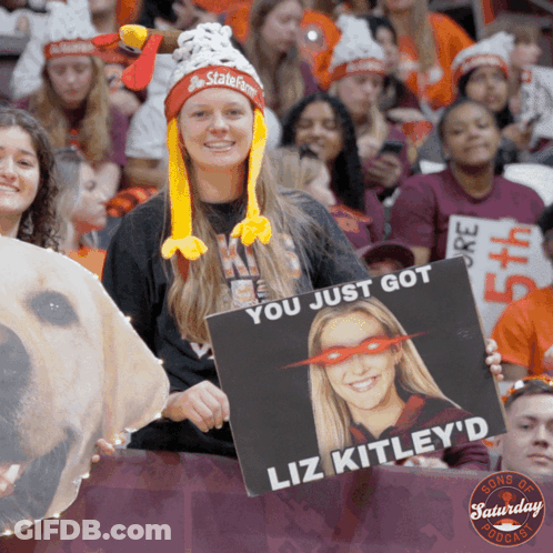 Woman Holding Sign You Just Got Liz Kitley D GIF
