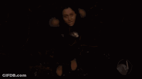 Woman Holding Small White Dog GIF