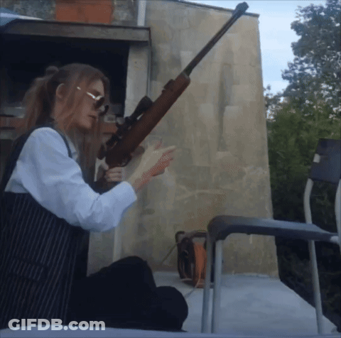 Woman Holding Sniper Rifle GIF