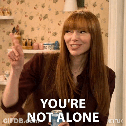 Woman Holding Soda Saying You Are Not Alone GIF