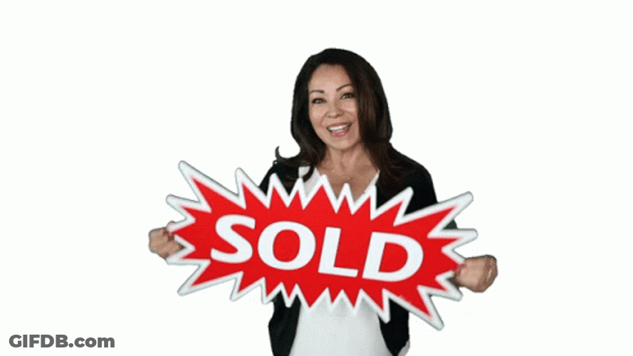 Woman Holding Sold Placard GIF