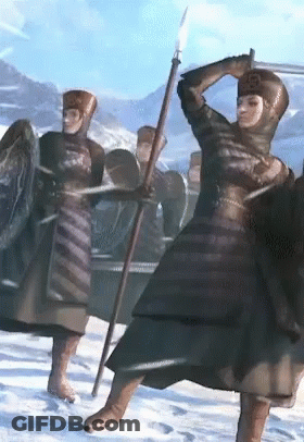 Woman Holding Spear With B On Head GIF