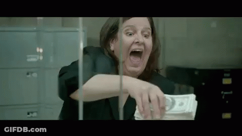 Woman Holding Stack Of Money Screaming GIF