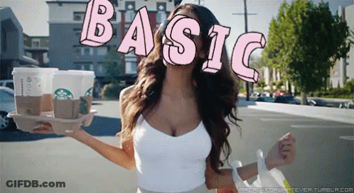 Woman Holding Starbucks Coffee With Basic On Face GIF
