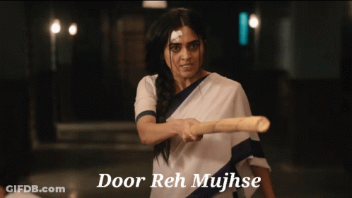 Woman Holding Stick Saying Door Reh Mujhse GIF